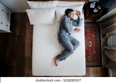 French Man Sleep Alone On Bed