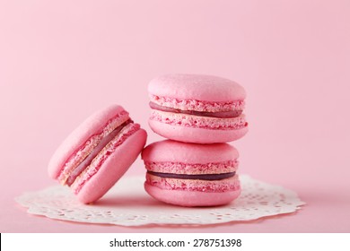 French pink macarons on pink background