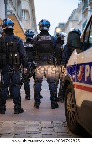 French police, CRS company deployed in the street to maintain order during a riot