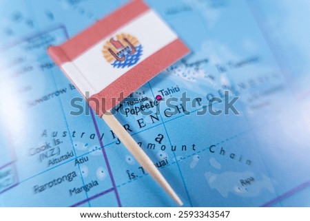 french polynesia flag on map highlighting papeete, the capital city on tahiti island, surrounded by turquoise lagoons, vibrant culture, and stunning pacific landscapes