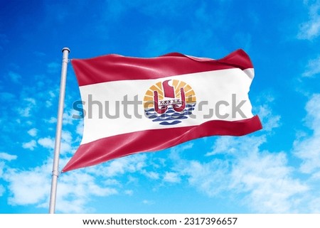 French Polynesia flag waving in the wind, blue sky background