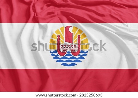 French Polynesia Flag Wind Waving CloseUp Breeze Wave. Rectangle Closeup of French Polynesia flag, deep shadows, and raw fabric air waves.