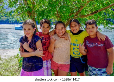 French Polynesia, Marquesas, Hiva Oa Island. 16 Of October 2017. Young Polynesian Kids On Vacations.