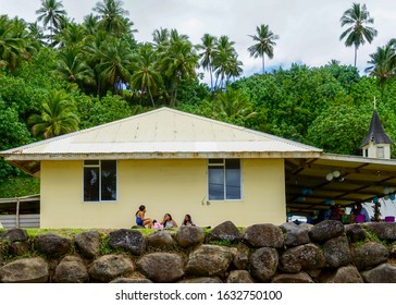 French Polynesia, Marquesas, Hiva Oa Island. 16 Of October 2017. Polynesian Kids Having A Snack Pause