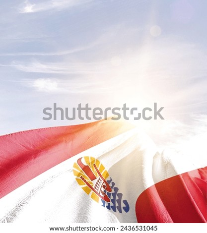 French Polynesia waving flag in beautiful sunlight.