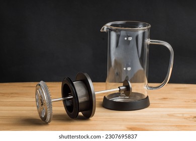 french press, black coffee brewing tool - Powered by Shutterstock