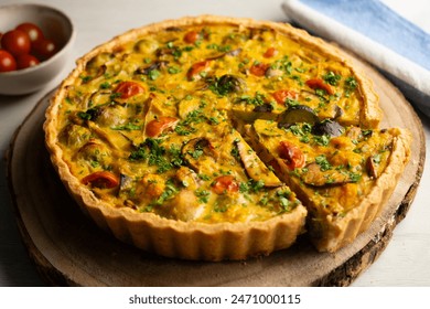 French quiche with fall vegetables such as brussels sprouts, sweet potato, and mushrooms. - Powered by Shutterstock