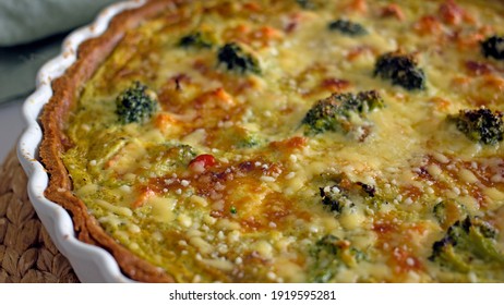 A French quiche pie  with salmon and broccoli