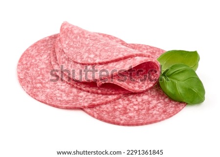 French Salami sausage slices, isolated on white background. High resolution image