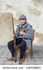 A French Soldier 1914 1918, Sitting On Chair, Reading Letter 