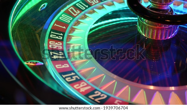 French style roulette table for money playing in
Las Vegas, USA. Spinning wheel with black and red sectors for risk
game of chance. Hazard amusement with random algorithm, gambling
and betting symbol.