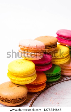 Similar – Image, Stock Photo Colored macaroons on rustic wooden background