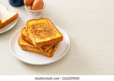 french toast on white plate for breakfast - Shutterstock ID 2162259035