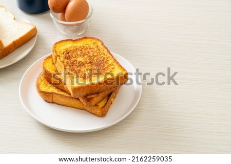 french toast on white plate for breakfast