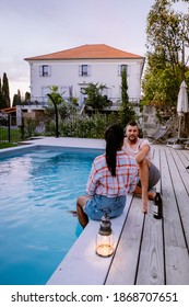 French Vacation Home With Wooden Deck And Swimming Pool In The Ardeche France Europe. Couple Relaxing By The Pool With Wooden Deck During Luxury Vacation At An Holiday Home In South Of France