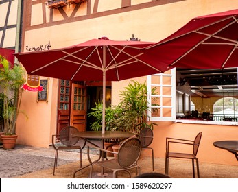 French Village Bukit Tinggi , Malaysia ;November 2019 : Street Cafe Furniture Red Umbrella No People Natural Day Light