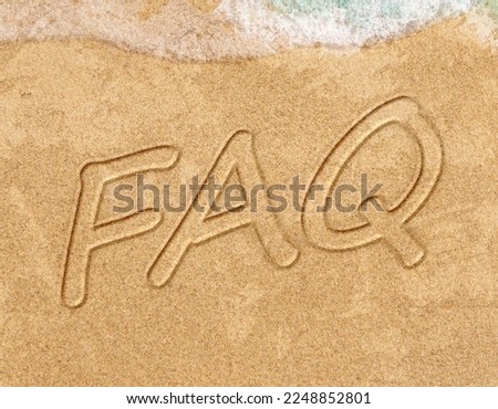 Frequently ask question concept, word faq written on beach