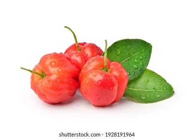 Fresh Acerola Cherry Fruits With Water Droplets And Green Leaves On White Background. 