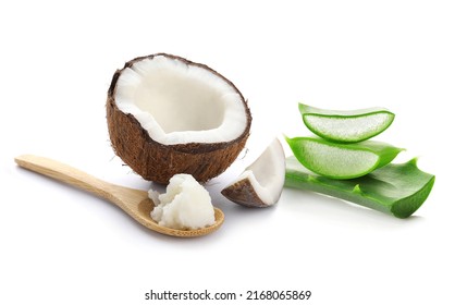 Fresh Aloe Vera Leaves And Coconut Oil On White Background