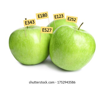 Fresh Apples With E Numbers On White Background. Harmful Food Additives 