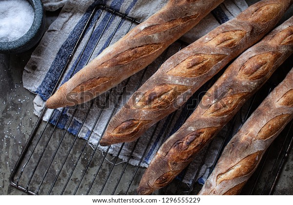 Fresh Artisanal Bread Baguettes On Grill Stock Photo (edit Now) 1296555229