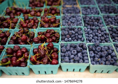 Fresh assorted berries at farmers market. Cherries and blueberries. Healthy vegetarian food. - Shutterstock ID 1478694278