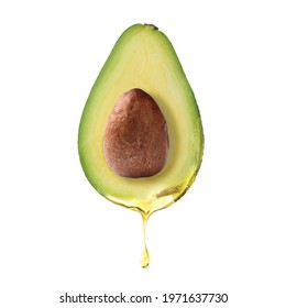 Fresh Avocado With Dripping Oil On White Background