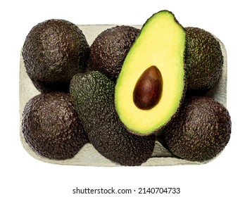 Fresh Avocado Isolated On White Background. Black Hass Avocado In A Paper Basket Closeup.
