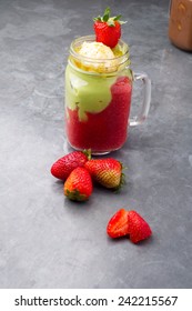 Fresh Avocado And Strawberry Smoothie On A Gray Vintage Table