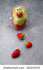 Fresh Avocado And Strawberry Smoothie On A Gray Vintage Table