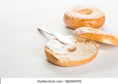 Fresh Bagel With Cream Cheese On White Background