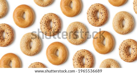Fresh bagel pattern isolated on white background, top view