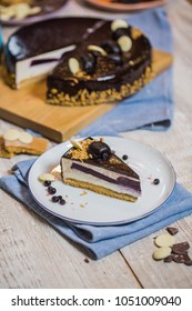 Fresh Baked Blueberry And Peach Pie Sitting On A Wooden Surface, Overhead Shot.