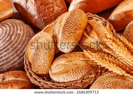 Fresh baked bread. Assorted bakery products loafs of bread and rolls...