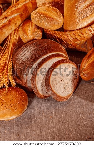 Fresh baked bread. Assorted bakery products loafs of bread and rolls...