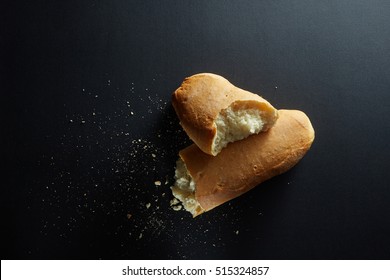 Fresh baked bread loaf broken