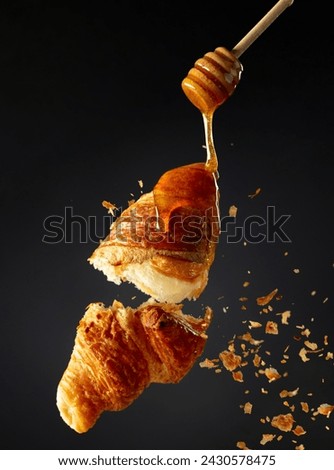 baked croissants with strawberry jam