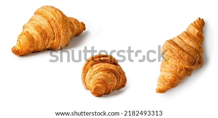 Fresh baked Croissants isolated on white background. Delicious french croissant on a white background.  Different angles. Front, top view
