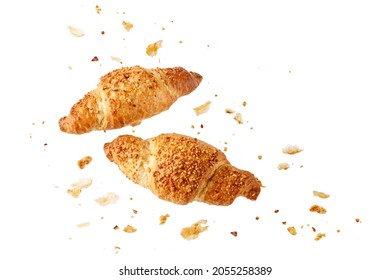 Fresh Baked With Crushed  Almond Nuts  Breakfast Croissants  And Crumbs And Flakes Flying Isolated On White Background. Pastry Shop Card