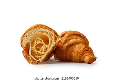 Fresh baked cut in half Croissant isolated on white background. Delicious french croissant cut.