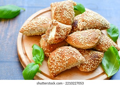 Fresh baked home made whole wheat  Gliten free  Mini cheese  puff pastries  .Cheese pie with phyllo pastry and herbs - Shutterstock ID 2210227053