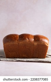 Fresh Baked Homemade Hokkaido Bread Loaf With Copy Space. Side View.
