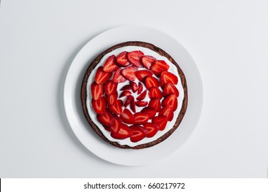 Fresh Baked Homemade Pie With Strawberries And Whipped Cream And Cinnamon On Rustic Background. Close-up. Top Or Overhead View. Thanksgiving Desserts Or Cake Sweet Pastry. Copy Space. 