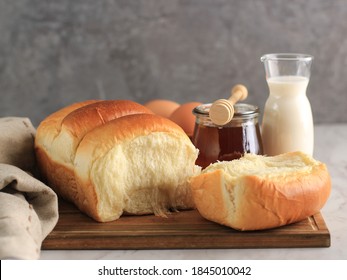 Fresh Baked Japanese Soft and Fluffy Bun White Bread, Popular as Hokaido Milk Bread . Homemade Japanese Brioche - Powered by Shutterstock