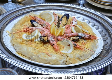 Fresh baked Moroccan fish pastilla close up
