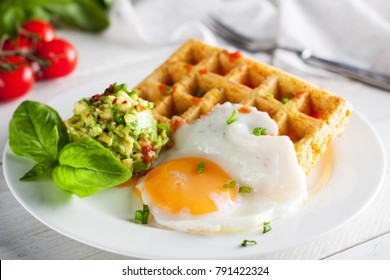 Fresh Baked Sweet Potato Waffles With Fried Egg And Avocado Dip. Healthy Breakfast