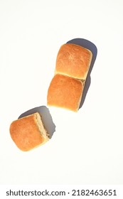 Fresh Baked Whole Grain Buns On A White Background With Copy Ad Space. Food Background. Still Life