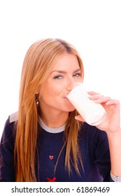 Fresh And Beautiful Woman With Milk Moustache Holding A Glass Of  Milk