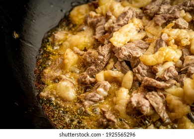 Fresh Beef And Suet Being Fried