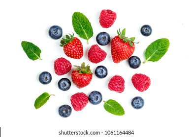 Fresh berries isolated on white background, top view. Strawberry, Raspberry, Blueberry and Mint leaf, flat lay - Shutterstock ID 1061164484